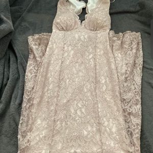 Cream colored prom dress size 5 only wore 1. Zipper in the back and neck latch.